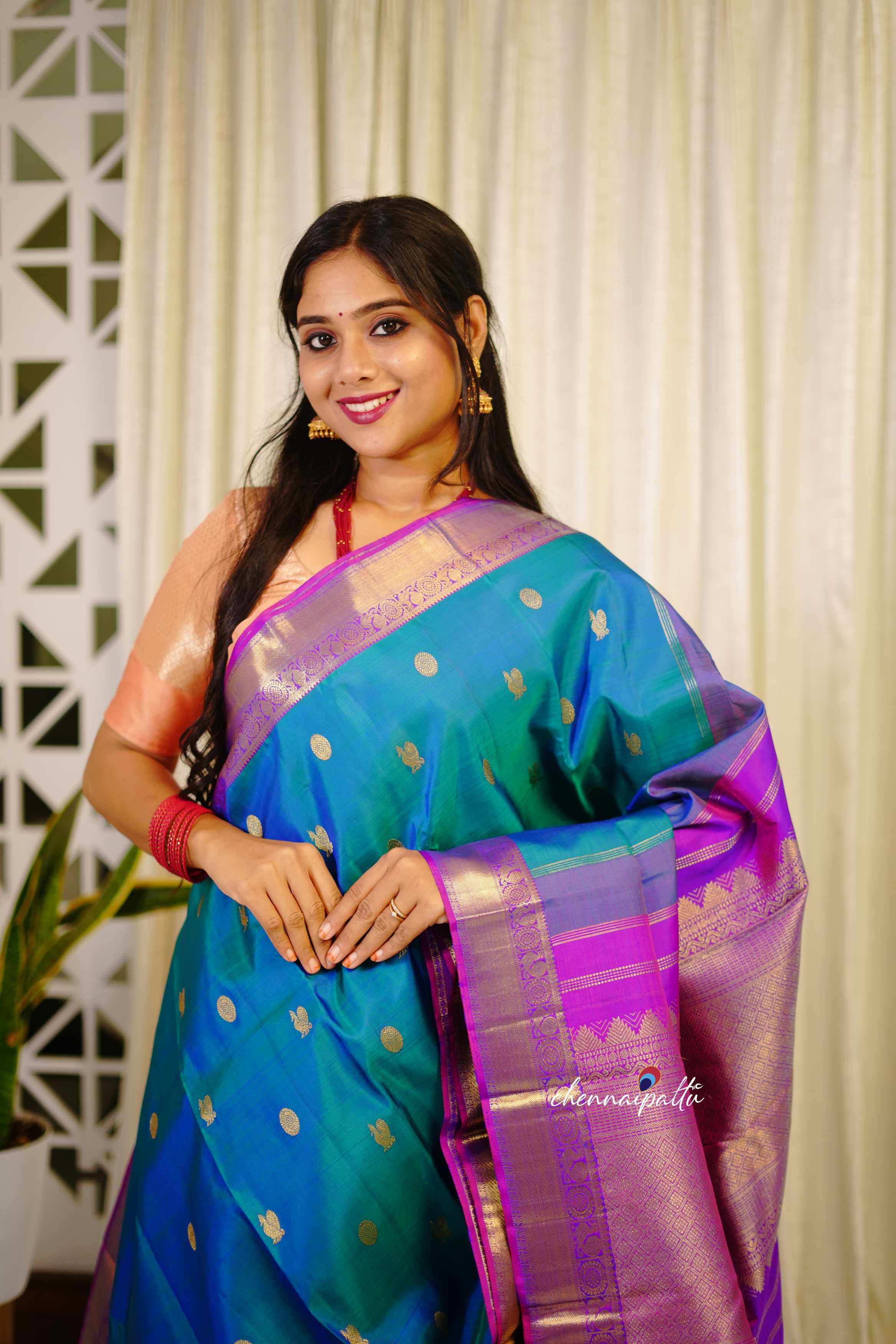 Thenmozhi