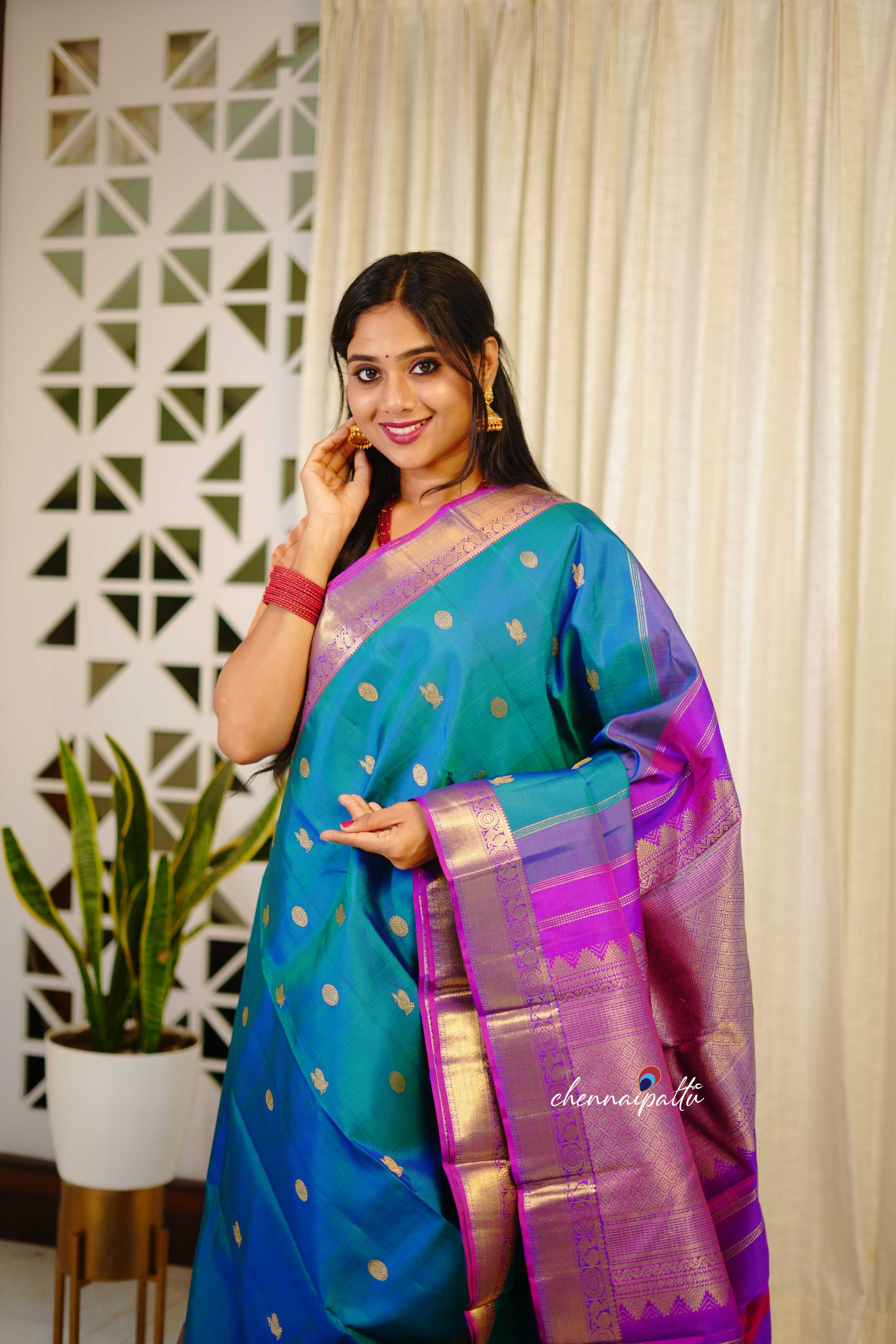 Thenmozhi