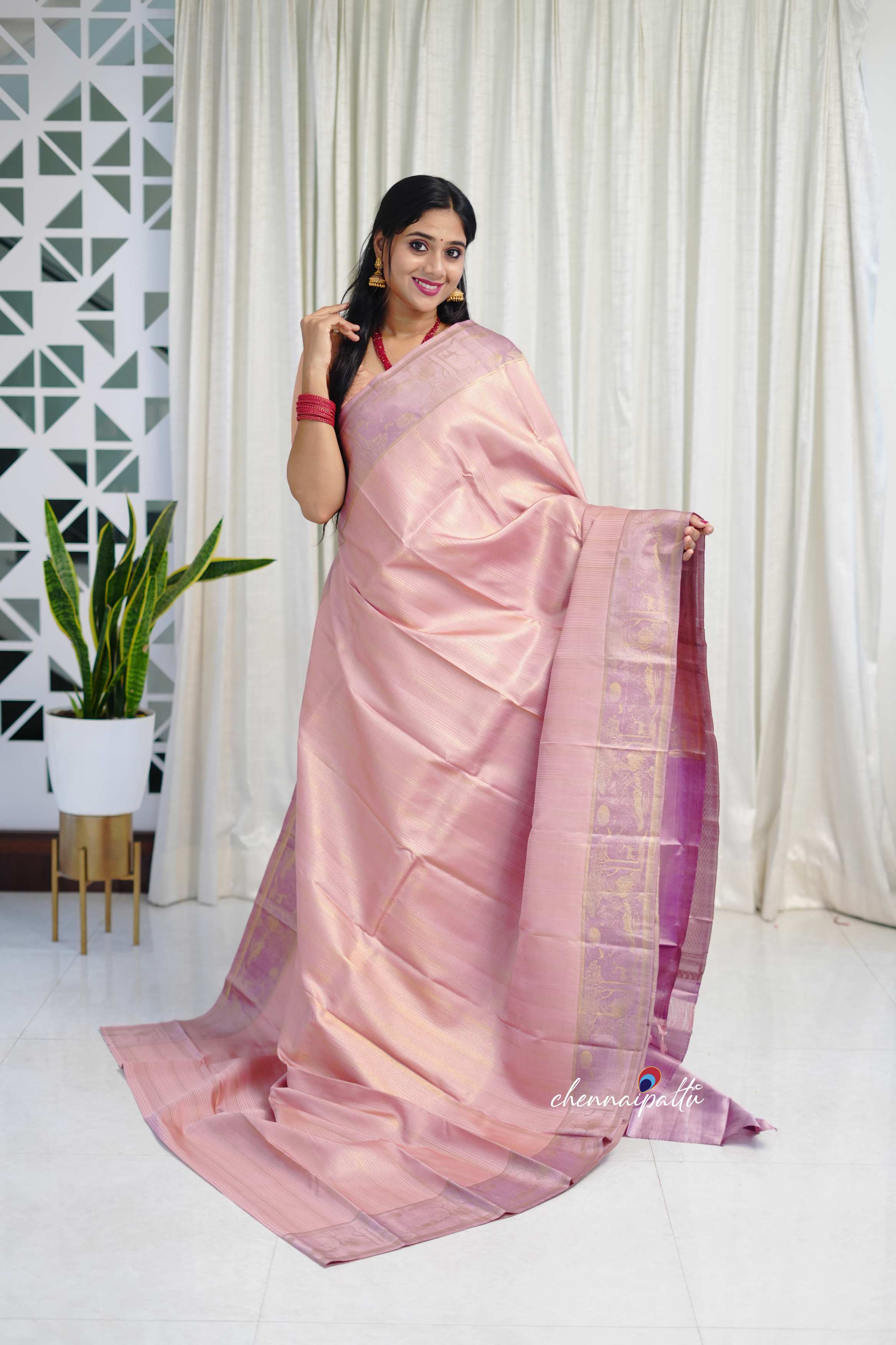 Thenmozhi