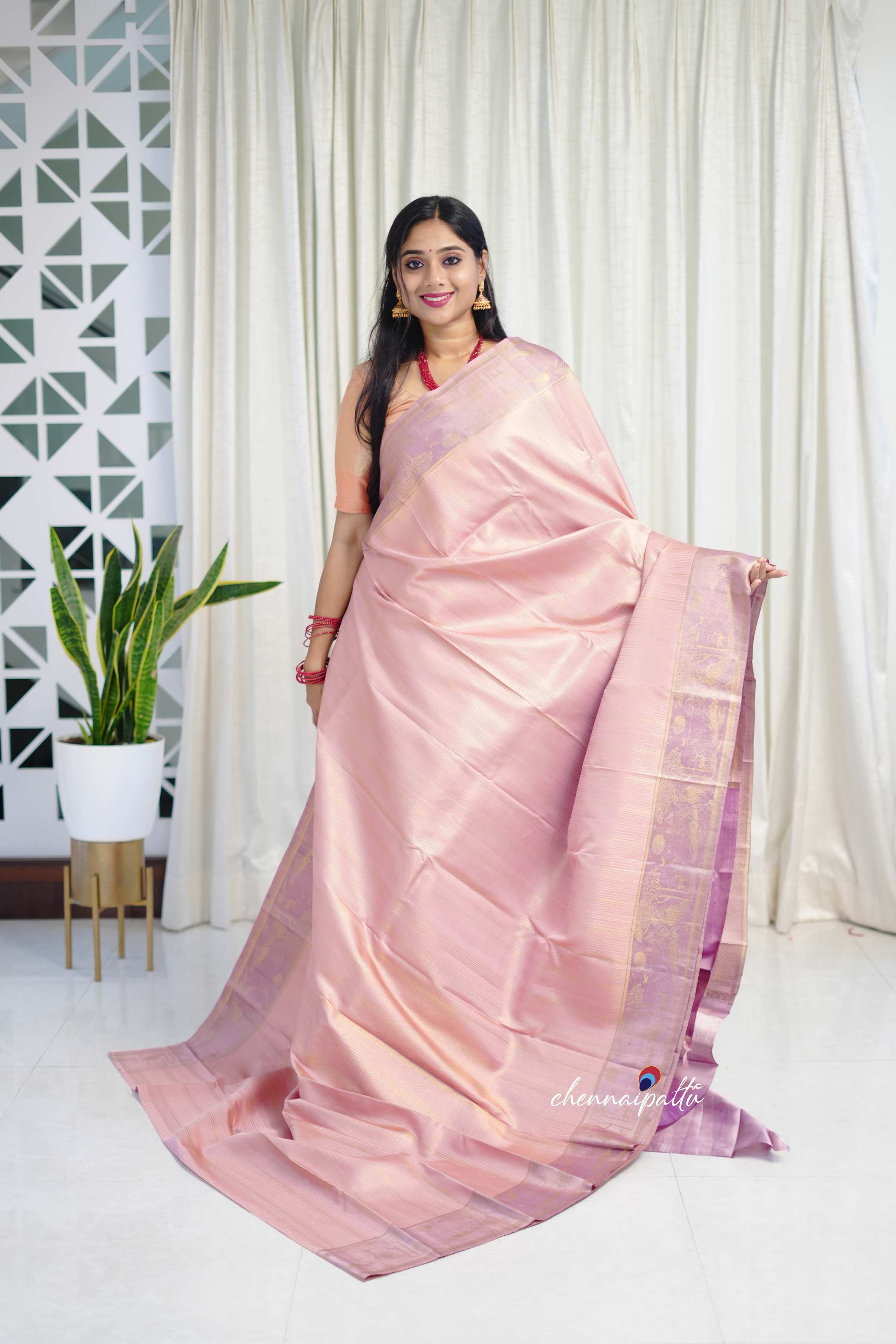 Thenmozhi